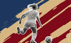 an excited north carolina courage soccer fan cheering on a match